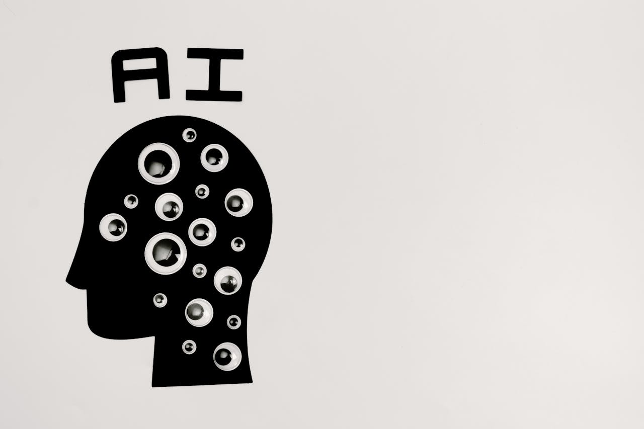 about-me-02 Abstract illustration of AI with silhouette head full of eyes, symbolizing observation and technology.